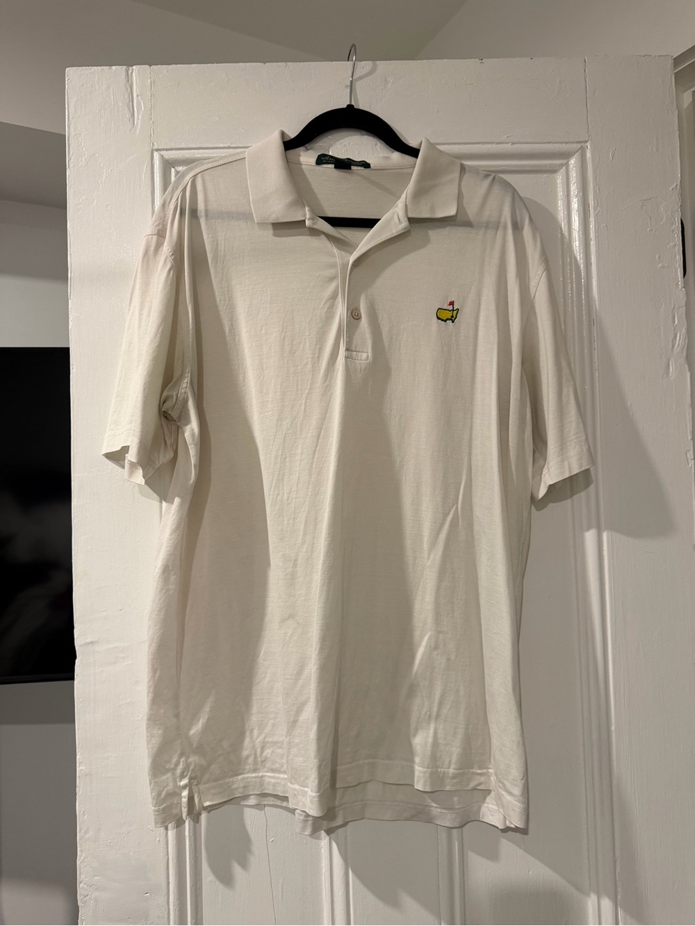 Masters White Polo with Small Yellow & Red Embroidered Logo